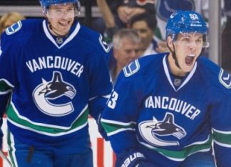 Canucks roll past Coyotes with 3-goal second period