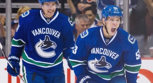 Canucks roll past Coyotes with 3-goal second period