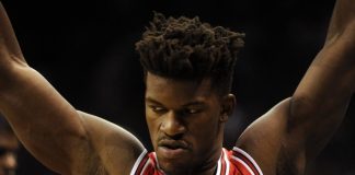Butler scores 42, Bulls rally to beat Raptors 123-118 in OT