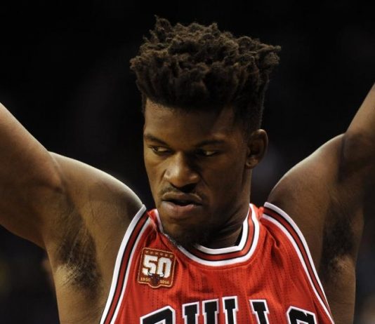 Butler scores 42, Bulls rally to beat Raptors 123-118 in OT