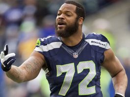 The Latest: Bennett gets ovation and support from protesters