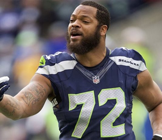 The Latest: Bennett gets ovation and support from protesters