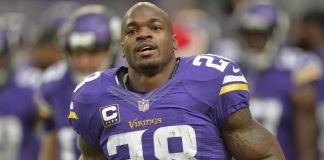 Peterson’s return marked with boos, not yards