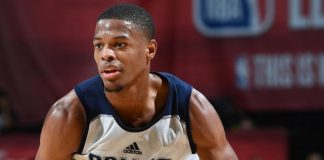 Mavs rookie G Smith sprains left ankle