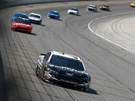 The Latest: Almirola wins 1st stage at Chicagoland