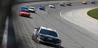 The Latest: Almirola wins 1st stage at Chicagoland