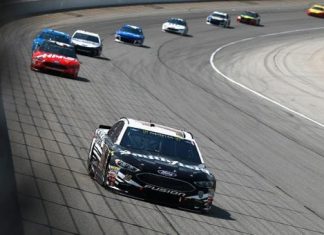 The Latest: Almirola wins 1st stage at Chicagoland