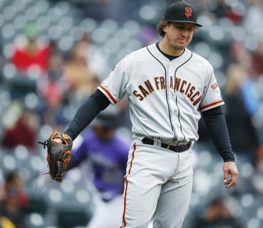Holland rips Giants” front office, says he faked injury