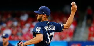 Houser posts 10 Ks, Brewers top Rangers 3-2 for 5th straight