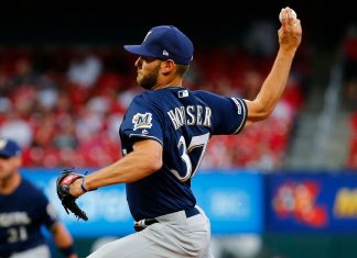 Houser posts 10 Ks, Brewers top Rangers 3-2 for 5th straight