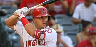 Trout hits 1st homer at Fenway, Angels rout Red Sox 12-4