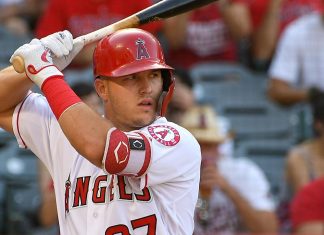 Trout hits 1st homer at Fenway, Angels rout Red Sox 12-4