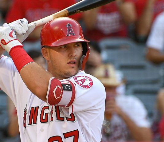 Trout hits 1st homer at Fenway, Angels rout Red Sox 12-4