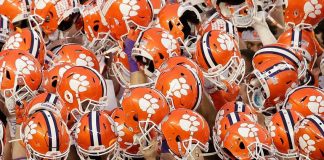 Clemson has 14 more football players test positive this week