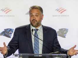 Panthers’ coach considers kneeling during national anthem