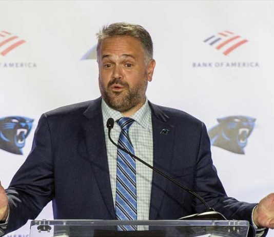 Panthers’ coach considers kneeling during national anthem