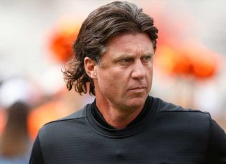 Oklahoma State’s Gundy takes pay cut in wake of T-shirt flap