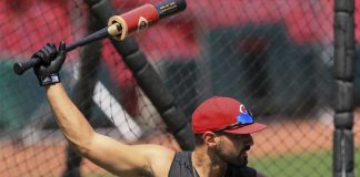Votto, Reds resume with unsettled feelings as workouts start